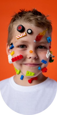 Child playing with colorful building blocks