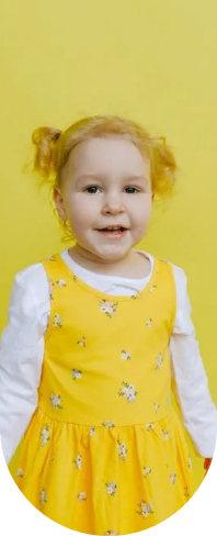 Child in a bright yellow dress